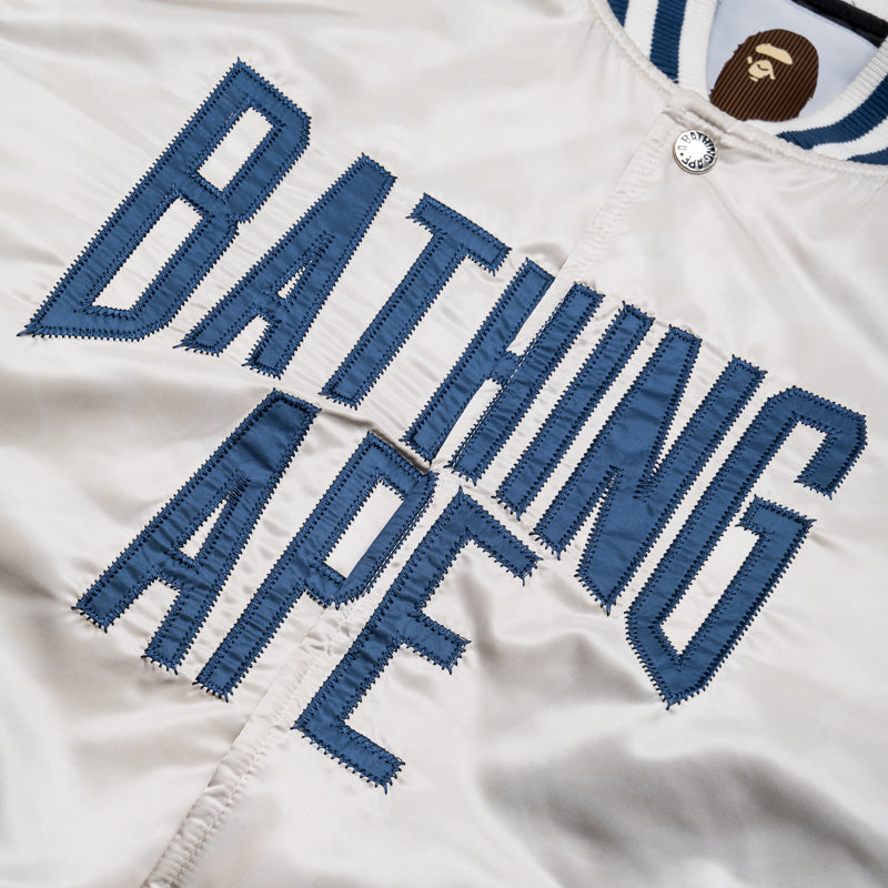 A Bathing Ape Solid Camo NYC Logo Varsity Jacket - Ivory